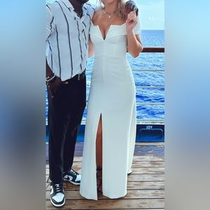 White full length formal gown with slit